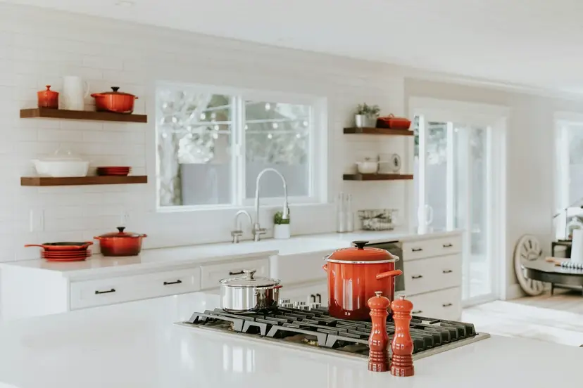 Modern kitchen remodel with quartz countertops, subway tile backsplash and under cabinet lighting